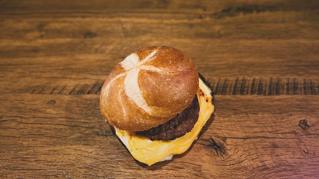 Sausage, Egg And Cheese Sandwich · Sausage patty and two fried eggs topped with melted cheese of your choice