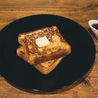 French Toast · Fluffy and tender on the inside, gloriously browned on the outside. Thick slices of bread, s...