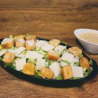 Caesar Salad · Romaine lettuce, croutons, parmesan & provolone cheese with our super creamy Caesar dressing