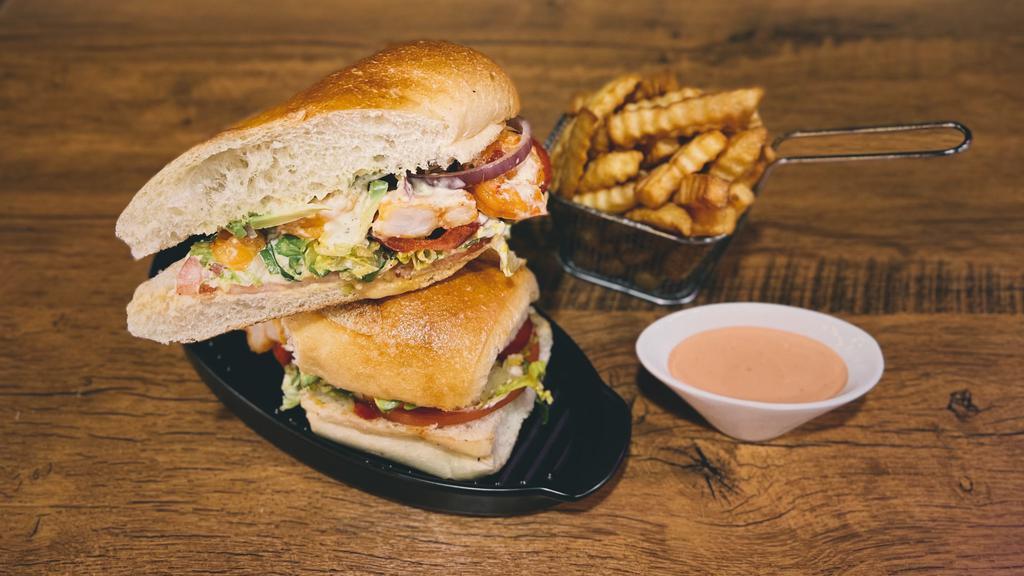 Aquaman Sandwich · Made with grilled shrimp, avocado, lettuce, tomatoes, red peppers and Cafecito's special house sauce.