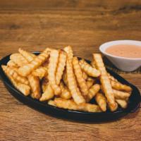 French Fries · Golden crinkle-cut French fries fried to perfection