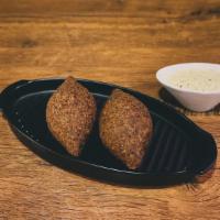 Quipe (Beef) · The Dominican version of the middle eastern kibbeh is a deep-fried, seasoned bulgur and meat...