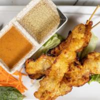 Chicken Satay · Four pieces. Chicken grilled on skewers with peanuts sauce.