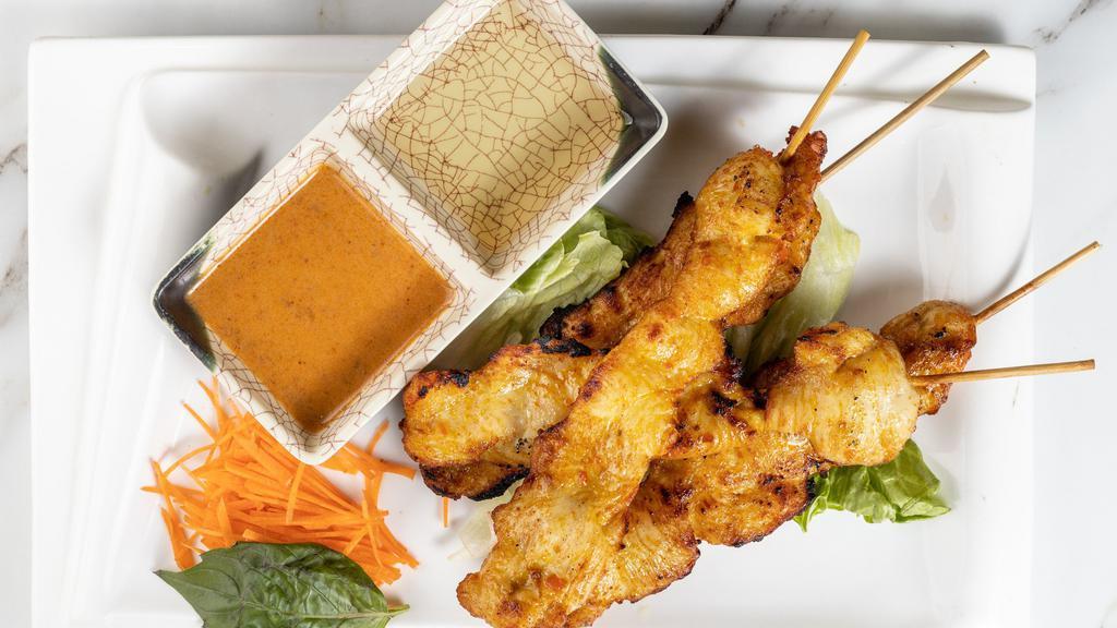 Chicken Satay · Four pieces. Chicken grilled on skewers with peanuts sauce.