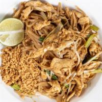 Pad Thai · Spicy. Stir-fried Thai noodles with egg, bean sprouts, dry tofu, and topped with ground pean...
