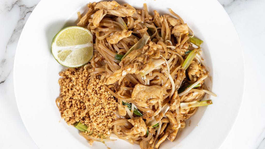 Pad Thai · Spicy. Stir-fried Thai noodles with egg, bean sprouts, dry tofu, and topped with ground peanuts.
