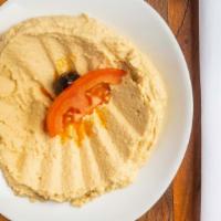 Humus / Hummus · Chick peas mashed into a paste with lemon juice and flavored with tahini.