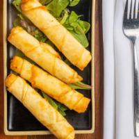 Sigara Boregi / Cheese Roll · Delicate filo dough wrapped with feta cheese and parsley then pan-fried.
