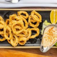 Kalamar Tava / Fried Calamari · Calamari rings lightly pan-fried and served with chef's homemade sauce.