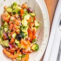 Coban Salatasi / Shepherd Salad · Fresh tomatoes, green peppers, cucumber, onions, parsley and dressing.
