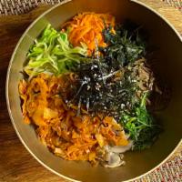 Spicy Kimchi Bibimbap · Spicy preserved Korean cabbage with vegetables and mushrooms.