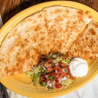 Quesadillas · Filling of your choice, served with pico de gallo, lettuce and sour cream.