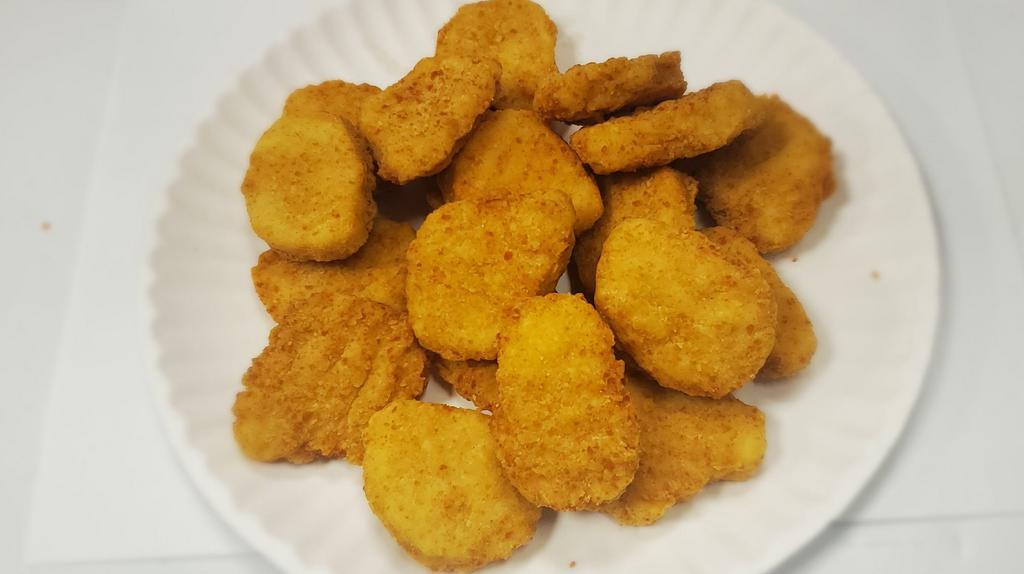 Chicken Nuggets 20 Pcs  · made with white meat, lightly coated in a tempura batter to ensure that they are crispy on the outside, and juicy and tender in the inside.
