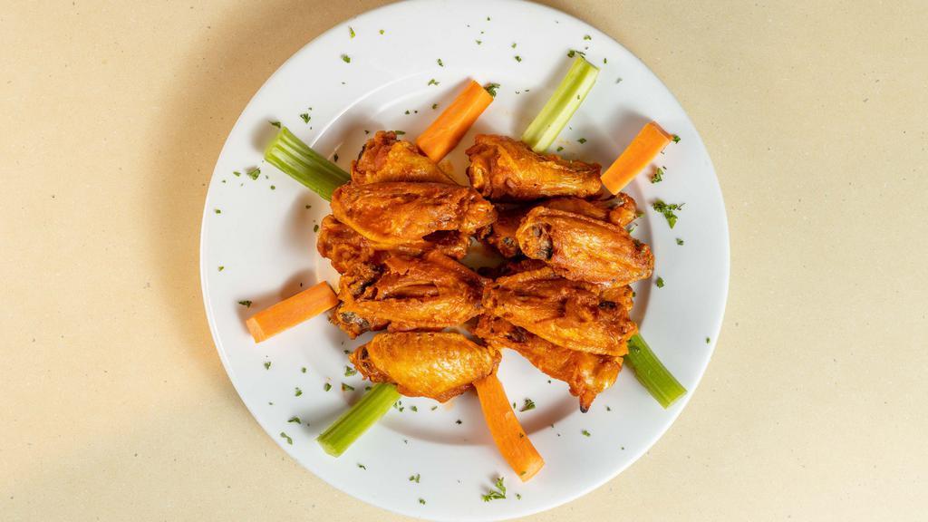 Buffalo Wings · 10 wings tossed in your choice of sauce.