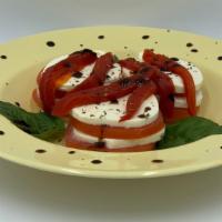 Fresh Mozzarella, Roasted Peppers & Tomato · Fresh Mozzarella slices, fresh tomatoes, fresh basil & roasted red peppers.  Served w/ a sid...