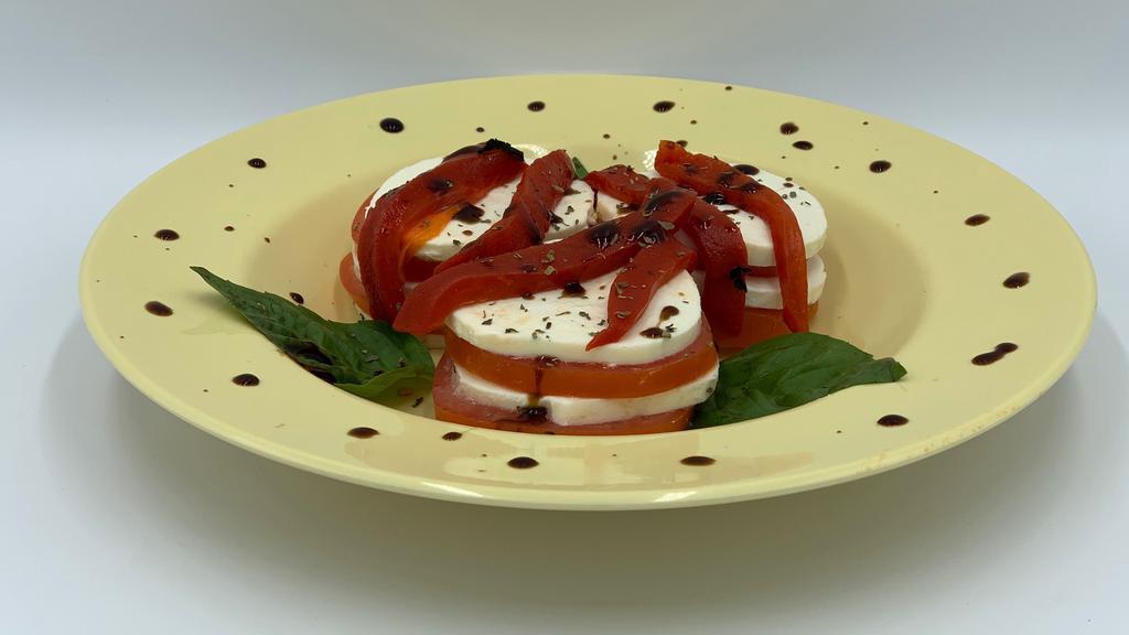 Fresh Mozzarella, Roasted Peppers & Tomato · Fresh Mozzarella slices, fresh tomatoes, fresh basil & roasted red peppers.  Served w/ a side of balsamic vinaigrette.