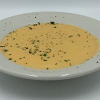 Lobster Bisque · Homemade Lobster Bisque Soup served w/ crackers.