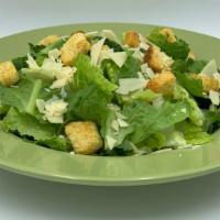Caesar - Large · Romaine Lettuce, Croutons & Shaved Parmesan.  Served w/ a side of Caesar dressing.