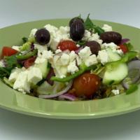 Greek Salad - Large · Iceberg Lettuce, Mixed Greens, Cherry Tomatoes, Cucumbers, Red Onions, Green Peppers, Kalama...