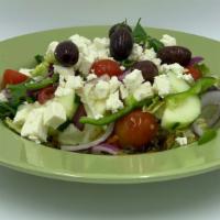 Greek Salad - Small · Iceberg Lettuce, Mixed Greens, Cherry Tomatoes, Cucumbers, Red Onions, Green Peppers, Kalama...