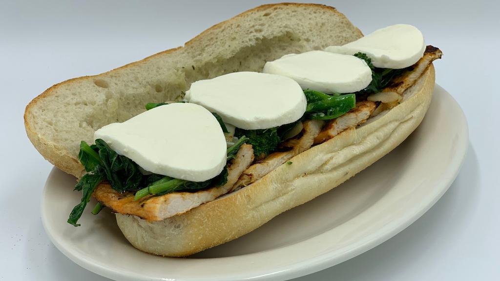 Grilled Chicken Broccoli Rabe · Grilled Chicken Cutlets topped w/ Sauteed Broccoli Rabe & Fresh Mozzzarella on a toasted Italian hero.  Served w/ a side of Balsamic Vinaigrette.