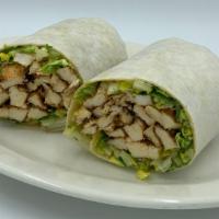 Chicken Caesar Wrap · Strips of marinated Grilled Chicken, Romaine lettuce, seasoned Croutons & shaved Parmesan se...