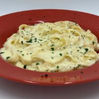 Fettuccini Alfredo · Fettucine sauteed in our delicious Alfredo Sauce.