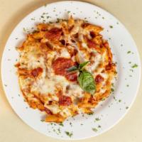 Baked Ziti With Ricotta · Baked Penne pasta w/ Ricotta, Mozzarella & Tomato Sauce.