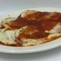 Baked Ravioli · Cheese ravioli topped with melted mozzarella in tomato sauce.