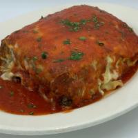 Homemade Lasagna · Baked Pasta sheets layered w/ Ground Beef, Ricotta, Mozzarella, Tomato Sauce & Romano!
