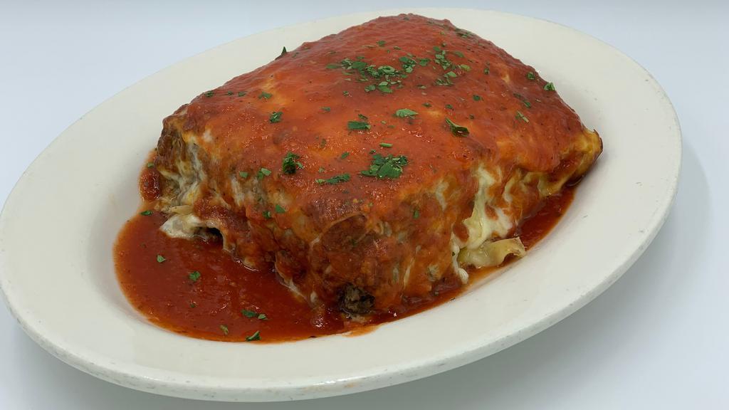 Homemade Lasagna · Baked Pasta sheets layered w/ Ground Beef, Ricotta, Mozzarella, Tomato Sauce & Romano!