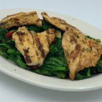 Grilled Chicken With Broccoli Rabe · Grilled Chicken Breast, Sauteed Broccoli Rabe, Roasted Peppers in a Garlic & Oil Sauce.