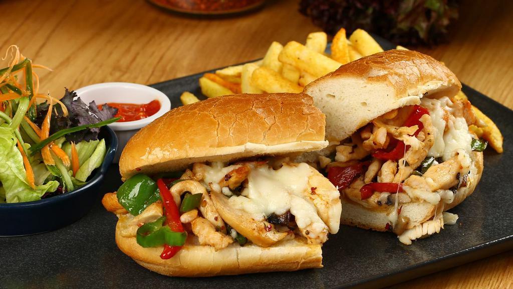 Teriyaki Chicken Sandwich · Grilled teriyaki chicken breast with sautéed peppers, onions, lettuce and tomatoes.