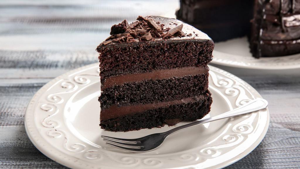 Chocolate Cake · Classic chocolate cake slice.