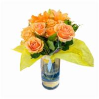 Summer Under The Sun · Orange bouquet of roses, glass vase included.