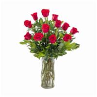 Coral Reef · Red bouquet of roses, glass vase included.