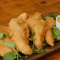 Chicken Tenders
 · 5 per portion with a side of honey mustard.