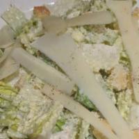 Classic Caesar Salad · Vegetarian. With shaved parmigiano cheese.