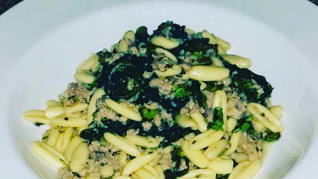 Homemade Cavatelli With Broccoli Rabe & Sausage · Homemade Cavatelli with sausage, broccoli rabe, garlic and oil.