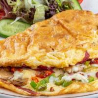 Pastrami Omelette · Sizzling pastrami, swiss cheese, peppers, and tomatoes.