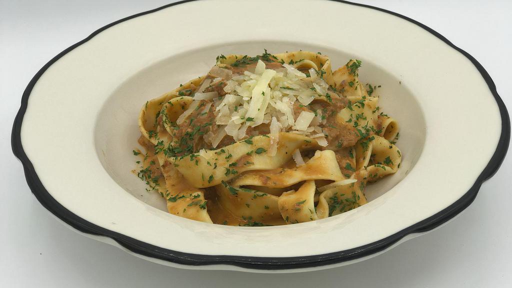Tagliattelle With Bolognese · TAGLIATTELLE BOLOGNESE	
Traditional Bolognese Sauce