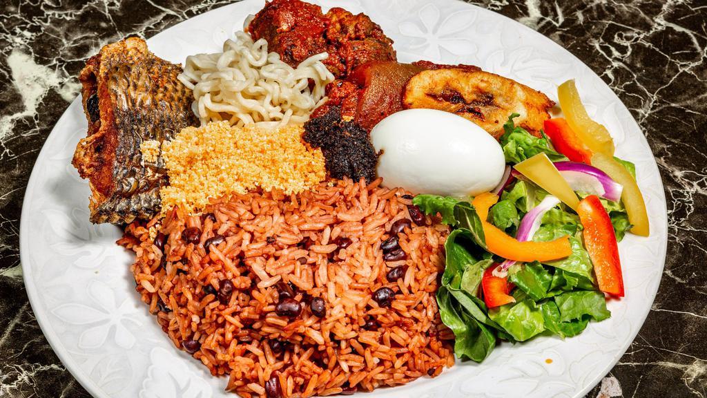 Waakye · Rice and beans served with tomato stew, Assorted meats, fish, shito, Gari, spaghetti, sweet plantain and a bowl of garden salad