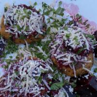 Quinoa & Sweet Potato Cakes · 3 cakes, served w/ vegan parmesan, marinated beets, berry salsa