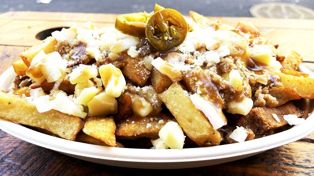 Impossible Poutine - Regular - New!!! · 16oz - Frites, Sautéed Plant-Based Meat, Canadian curd cheddar cheese, Topped with Veg Gravy