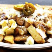 Impossible Poutine - For 2 - New!!! · 32oz - Frites, Sautéed Plant-Based Meat, Canadian Curd Cheddar Cheese, Topped with Veg Gravy