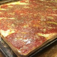 Grandma Pizza · Square thin square crust layered with Mozzarella cheese topped with marinara sauce, fresh ga...