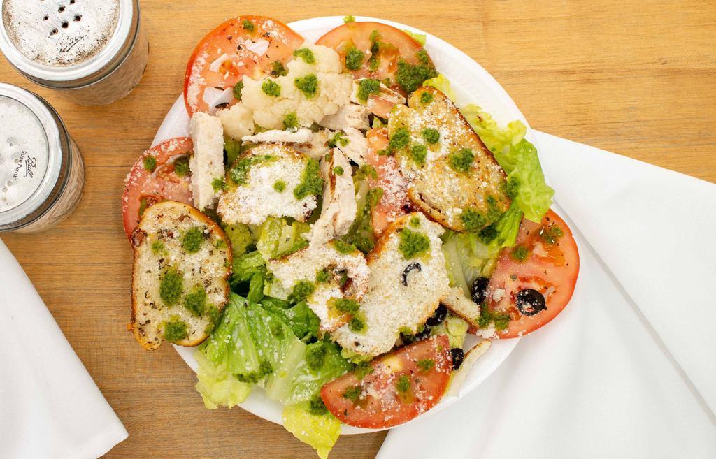 Caesar Salad · Sliced tomatoes sprinkled with Parmesan cheese and homemade croutons.