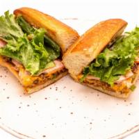 Beyond Chopped Cheese · Grilled Beyond Meat, provolone, greens, onions & peppers, sub roll