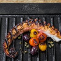 Grilled Octopus · Cherry tomato, kalamata olive, capers, reduced white wine vinegar.
