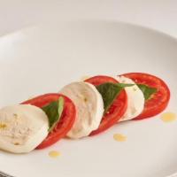 Caprese · Fresh Mozzarella cheese, roasted pepper, tomato, basil, balsamic vinegar